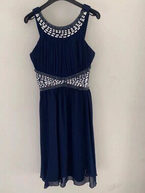 The graduation ceremony's festive blue evening gown